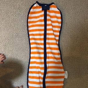 Woombie swaddle for 9-14 pound baby. No arm holes.